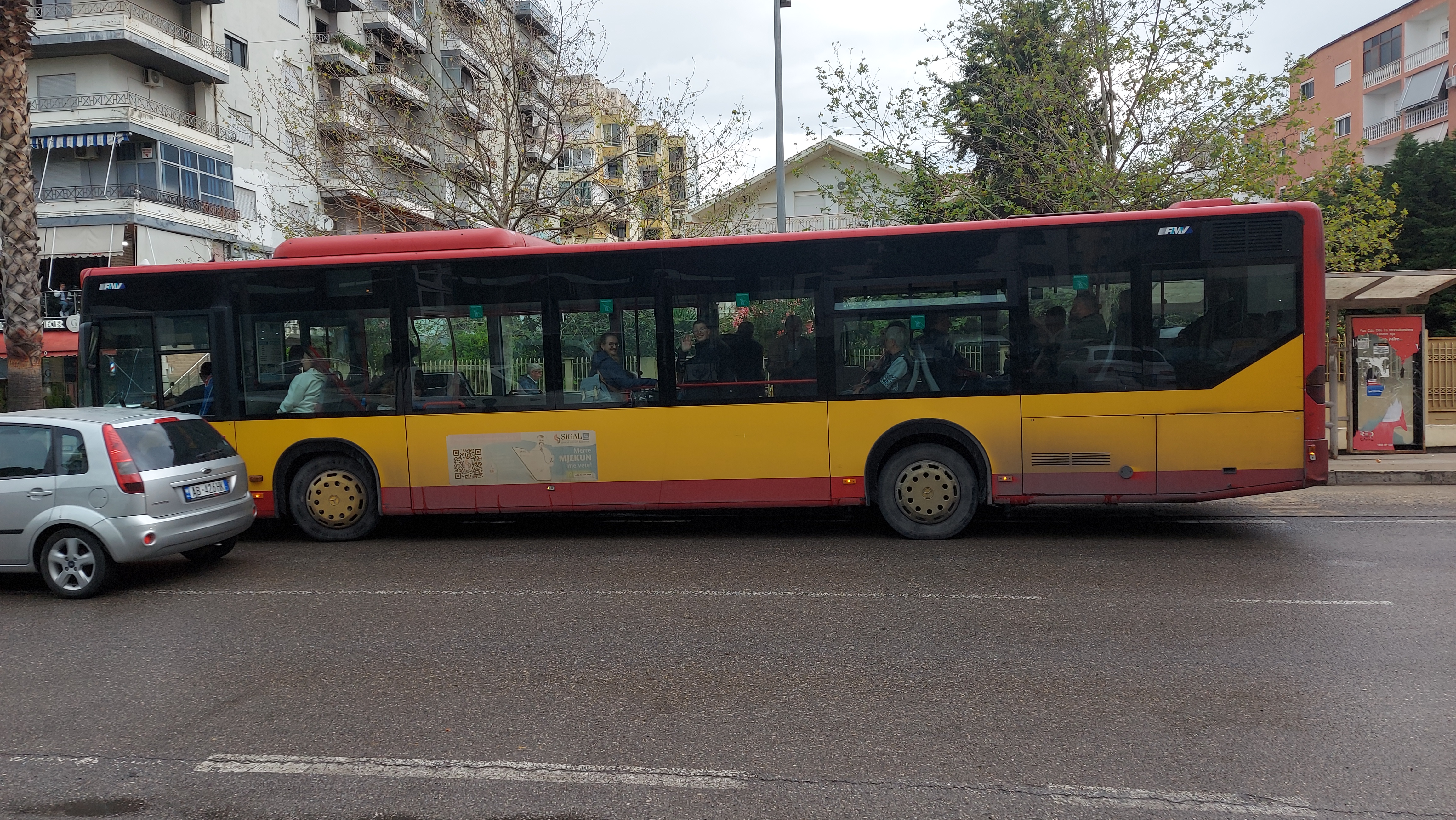 The red bus to the city center.